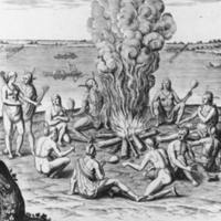 Praying Around the Fire With Rattles